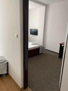Postel nebo postele na pokoji v ubytování Hotel Slanica + 37 fotografií