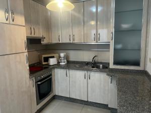 Kuchyňa alebo kuchynka v ubytovaní Apartamentos Redondela - Centro histórico