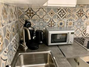 O bucătărie sau chicinetă la T2 Chic et Cosy à Montréjeau