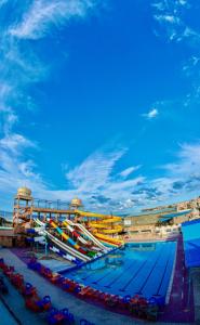 a large swimming pool on a cruise ship at الف ليله و ليله اكوا بارك بورسعيد in Port Said