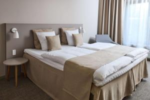 Best Western Plus Hotel Odense客房内的一张或多张床位