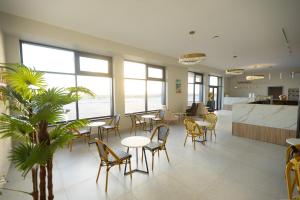 Restaurant ou autre lieu de restauration dans l'établissement Zhagalau Resort