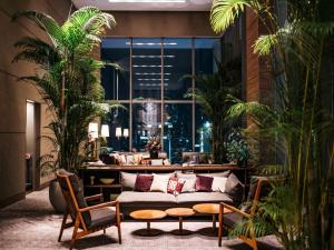 Uma área de estar em Hotel Resol Trinity Hakata