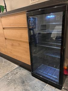 an oven with its door open in a kitchen at Suite Aurora in Crotone