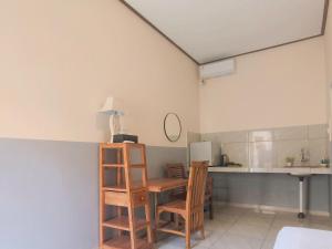 Kuchyň nebo kuchyňský kout v ubytování Guest House 88 Pandawa