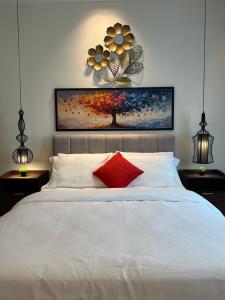 Postel nebo postele na pokoji v ubytování LoFF Suite 2 Bedroom at Kuching Riverine Resort