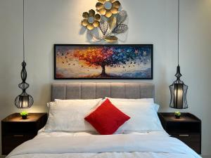 Postel nebo postele na pokoji v ubytování LoFF Suite 2 Bedroom at Kuching Riverine Resort