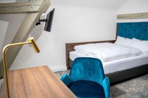 Letto o letti in una camera di Hotel am Prinzengarten, inklusive AlbCard