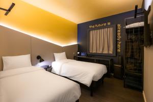 Postel nebo postele na pokoji v ubytování Ibis Styles Barretos