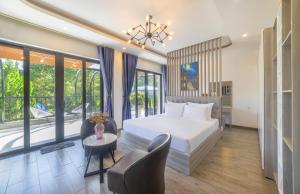 Letto o letti in una camera di TP Dalat Hotel