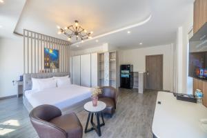 Letto o letti in una camera di TP Dalat Hotel