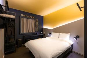 Postel nebo postele na pokoji v ubytování Ibis Styles Barretos