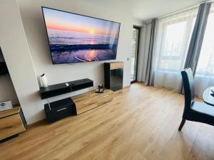 TV a/nebo společenská místnost v ubytování Golden Suite