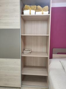 Posteľ alebo postele v izbe v ubytovaní Isis Apartment