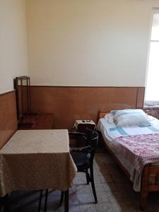 Postel nebo postele na pokoji v ubytování Triomphe Hostel