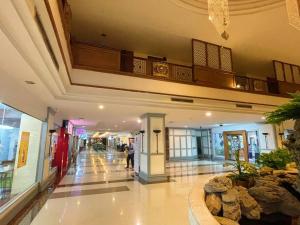 a lobby of a shopping mall with a large building at 912 Good view &2 minutes walk to one Nimman Maya in Chiang Mai