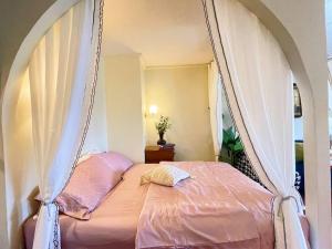 a bed in a room with a swing at 912 Good view &2 minutes walk to one Nimman Maya in Chiang Mai