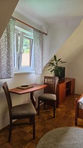 A seating area at Guest House Pod Grebenom