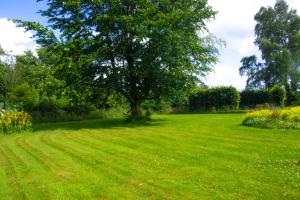 Taman di luar Astrup vig Spa og Sauna