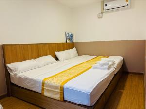 Dado9home客房内的一张或多张床位