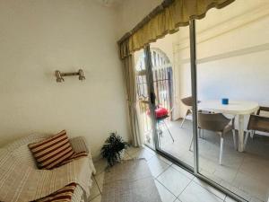 Χώρος καθιστικού στο Busa House - Triple Room