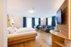 TV a/nebo společenská místnost v ubytování Hotel Jägerhof
