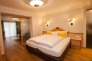 Postel nebo postele na pokoji v ubytování Hotel Jägerhof