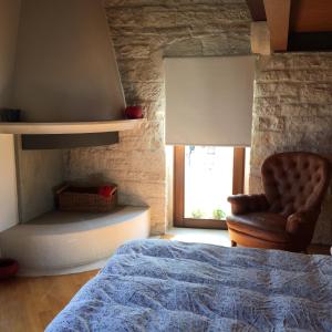 Кровать или кровати в номере Casa Torre Di Mactheus Petraro