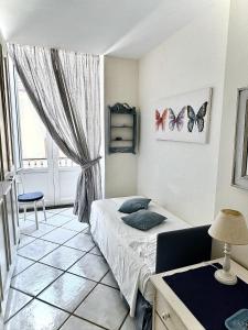Posteľ alebo postele v izbe v ubytovaní L'Ancora Amalfi Dreams