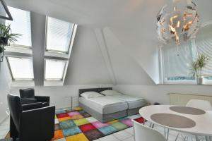 Posezení v ubytování Studioappartment SAALEBLICK
