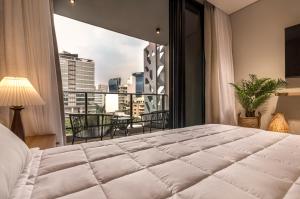 ZENTRUM - Stay & Residences by AVA 객실 침대