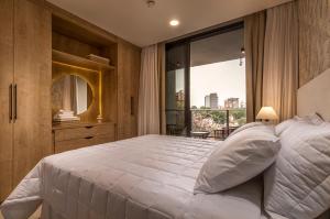 ZENTRUM - Stay & Residences by AVA 객실 침대
