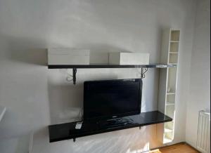 TV a/nebo společenská místnost v ubytování Jelena