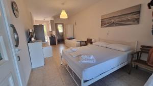 Postel nebo postele na pokoji v ubytování Ionian Dream Home