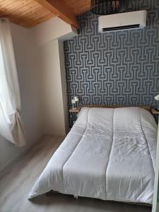 Grande maison de vacances récente客房内的一张或多张床位
