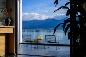 Gambar di galeri bagi 大理石之上Cloud Edge Cabin全视野苍洱半山海景别墅酒店洱海观景店 di Dali +271 gambar