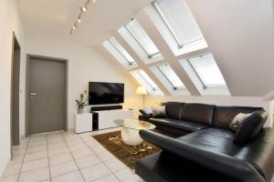 TV a/nebo společenská místnost v ubytování Studioappartment SAALEBLICK