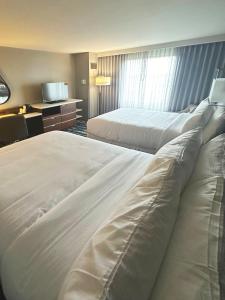 Postel nebo postele na pokoji v ubytování Memphis Vitality Hotel