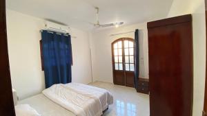 Letto o letti in una camera di villa Sun Wing - Guest House