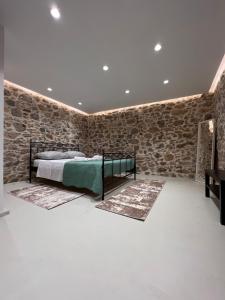 Ένα ή περισσότερα κρεβάτια σε δωμάτιο στο Prina Stone Retreat