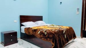 Letto o letti in una camera di villa Sun Wing - Guest House