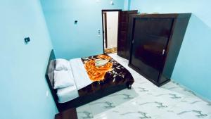 Letto o letti in una camera di villa Sun Wing - Guest House