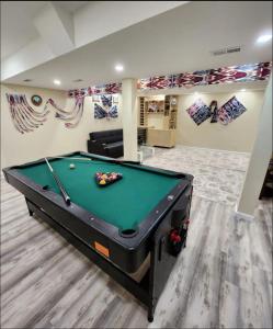 a billiard room with a pool table at Perfect House in Pocono with hot tub and sauna steam in Tobyhanna +25 photos