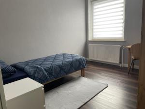 Postel nebo postele na pokoji v ubytování Monteur- oder Studentenzimmer