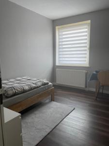 Postel nebo postele na pokoji v ubytování Monteur- oder Studentenzimmer