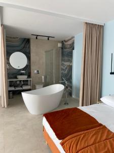 Koupelna v ubytování Plaża Resort Łeba & Wellness