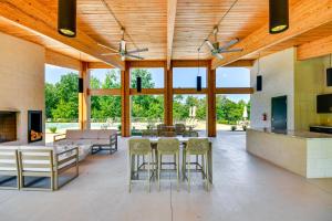 a large open living room with a table and chairs at Hot Tub and Game Room! Family Connelly Springs Home in Connelly Springs