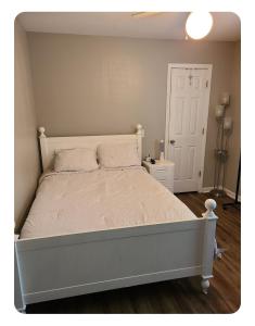 Ένα ή περισσότερα κρεβάτια σε δωμάτιο στο Staycation Oasis