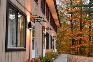 a building with windows on the side of it at Cozy Cottage in Middle Grove