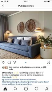 a flyer with a blue couch in a living room at Casita Azul in Moncófar